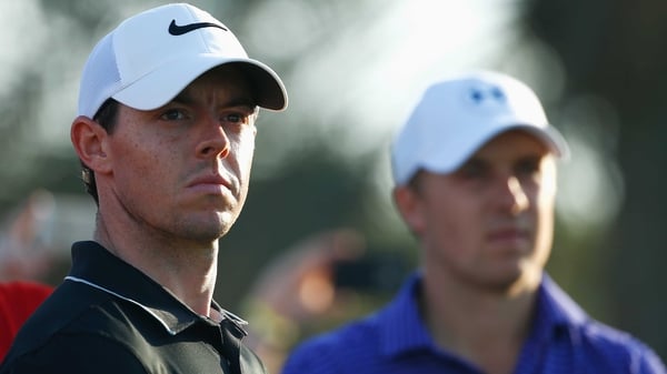 Rory McIlroy (L) was one of just four men to shoot a 71 at Augusta on Friday