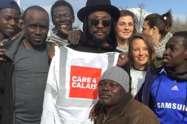 will.i.am visits Calais for the second time this week and distributed aid