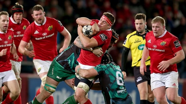 CJ Stander is tackled by John Muldoon and Aly Muldowney at Thomond Park earlier in the season