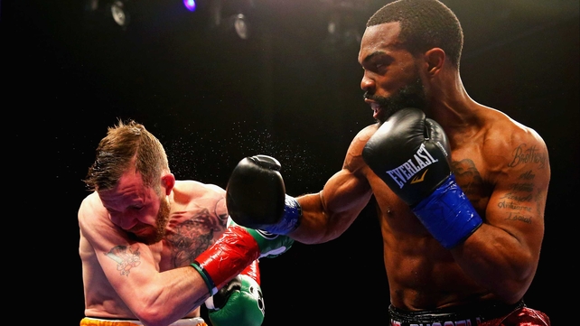 Hyland takes a heavy right to the head