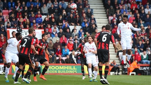 Daniel Sturridge heads in Liverpool's second just before half-time