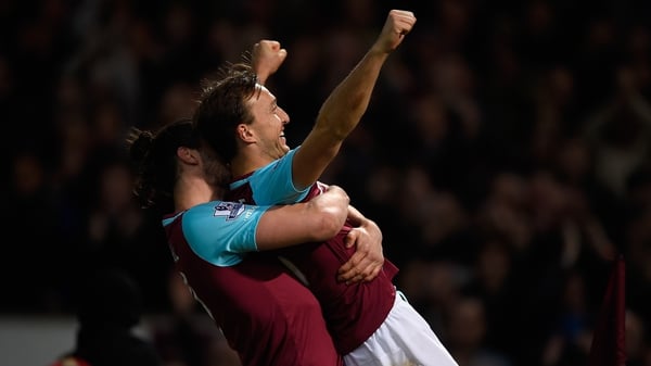 Mark Noble celebrates with Andy Carroll