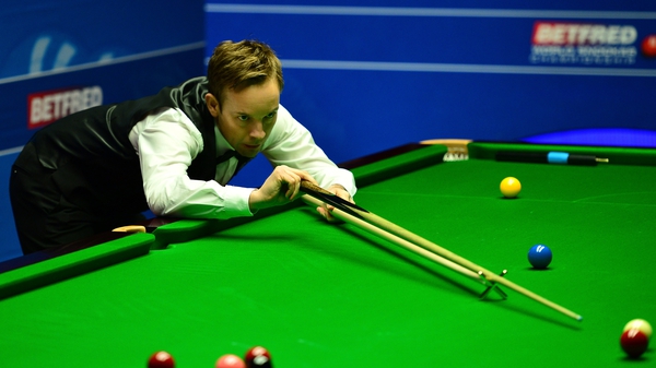 Ali Carter exited the World Snooker Championship after a 13-11 defeat to Alan McManus