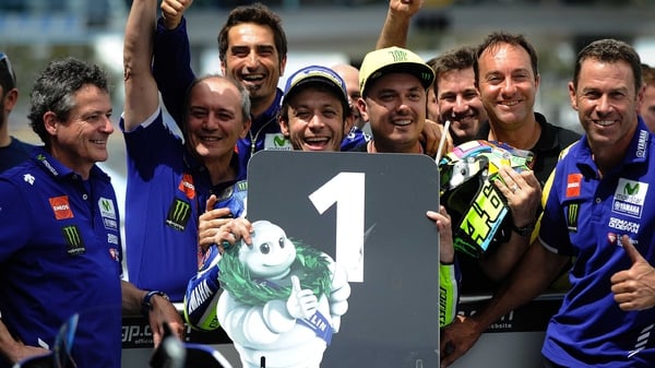 Valentino Rossi celebrates his first pole position in almost a year