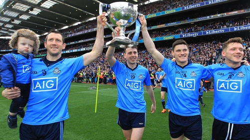 Dublin players celebrate winning the Allianz Division 1 title