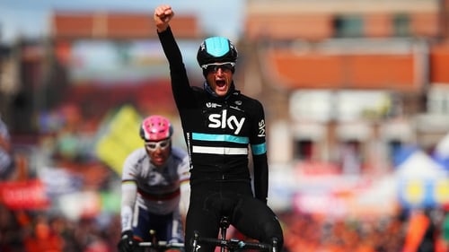 Wout Poels celebrates as he crosses the finishing line after winning Liege-Bastogne-Liege