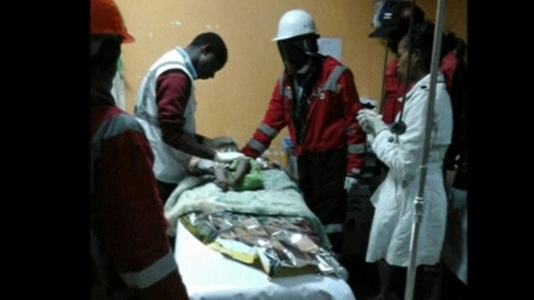Doctors treat the baby who was pulled alive from the rubble of a collapsed building (Pic: Bonny Odhiambo/Kenya Red Cross)