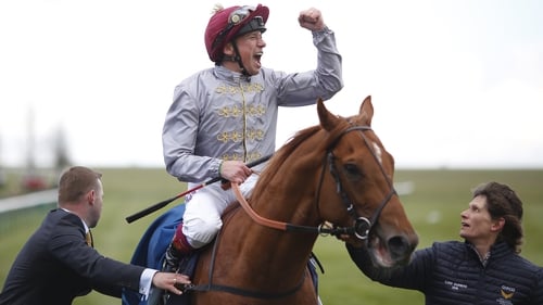 Frankie Dettori celebrates after riding Galileo Gold to win The Qipco 2000 Guineas Stakes at Newmarket