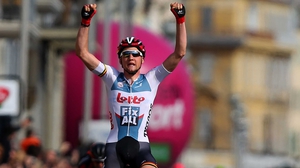Tim Wellens celebrates as he crosses the finish line