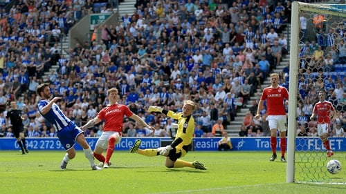 Wigan striker Will Grigg scores against Barnsley earlier this month