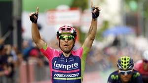 Diego Ulissi of team Lampre-Merida celebrates as he crosses the finish line to win the 11th stage of the 99th Giro d'Italia