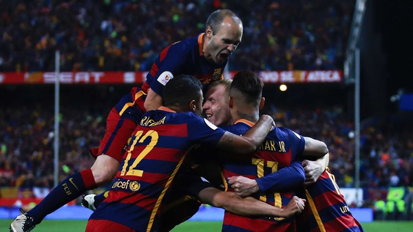 Barcelona players celebrate their Copa del Rey win against Sevilla