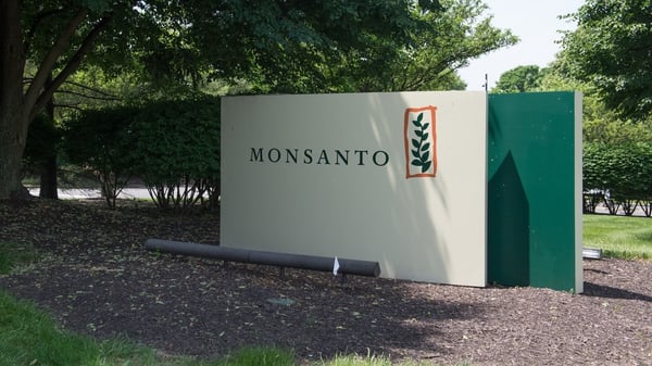 Monsanto reaffirms its ongoing earnings per share target and raised its gross profit outlook for its seeds and genomics unit