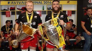 Jackson Wray and Will Fraser celebrate their 'double' success with the European Cup and Premiership trophies