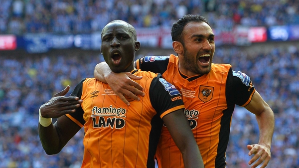 Mohamed Diame (left) celebrates the goal that won promotion for Hull City