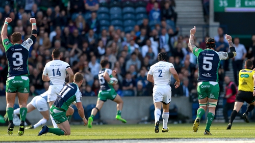 Tiernan O'Halloran sprints clear for the opening Connacht try