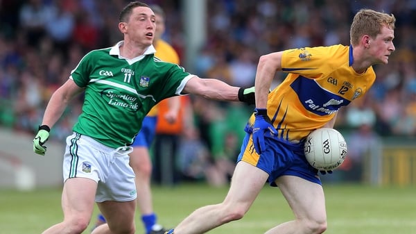 Pete Nash and Pearse Lillis in action during the Munster SFC