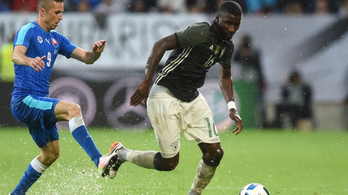 Slovakian midfielder Stanislav Sestak (L) and Germany's defender Antonio Ruediger vie for the ball