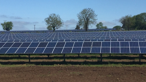 In practice a co-operative of local people near a solar or wind farm would be able to buy in shares