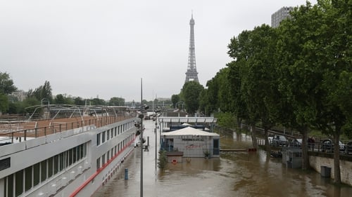 The Eiffel tower and the flooded banks of the river Seine following heavy rainfall in Paris