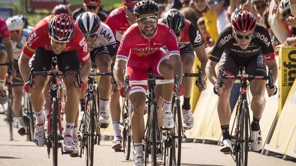 Sam Bennett (right) is beaten in a sprint finish by Nacer Bouhanni (centre) and Jens Debusschere (left)