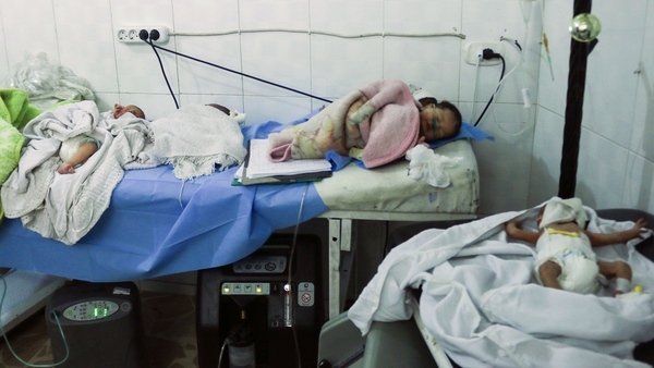 Newborns were evacuated from the children's hospital following airstrikes