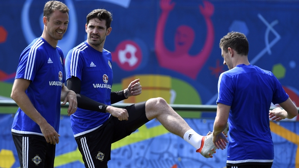 Kyle Lafferty (C) and defender Jonny Evans (L) at Northern Ireland training today