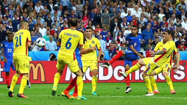 Dimitri Payet scores France's winner against Romania