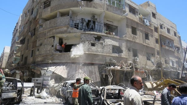 Twin suicide and car bomb blasts hit Damascus neighbourhood