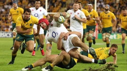 England's James Haskell is tackled just short of the line