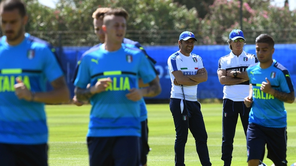 Italy boss Antonio Conte watches his players in training