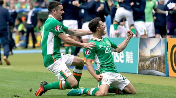Wes Hoolahan celebrates with Robbie Brady after his brilliant goal