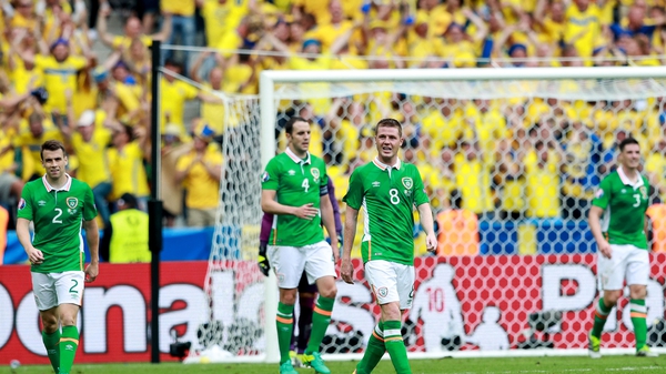 Ireland players show their dejection after Sweden leveled