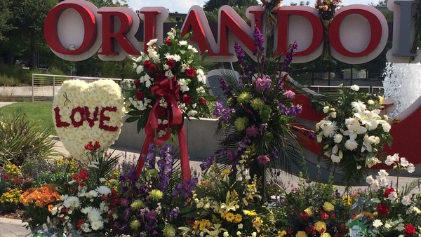 Flowers are left near the Pulse nightclub in Orlando