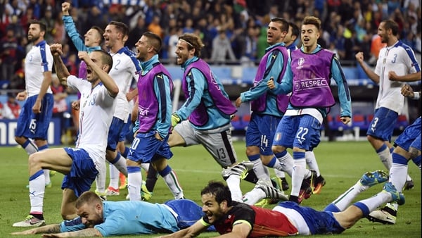 Italy celebrate in front of their supporters after full-time