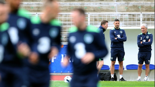 Jon Walters looks on as his team-mates are put through their paces at the Stade de Montbauron in Versailles