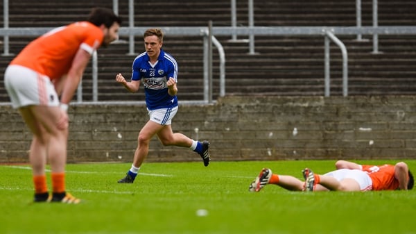 Ross Munnelly celebrates scoring the final point of the game for Laois