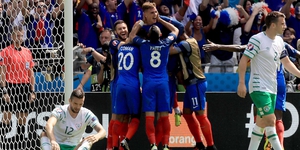 France players celebrate with Antoine Griezmann after he scored his second goal against the Boys in Green