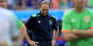 A downhearted Martin O'Neill on the Lyon pitch following Ireland's Euro 2016 elimination