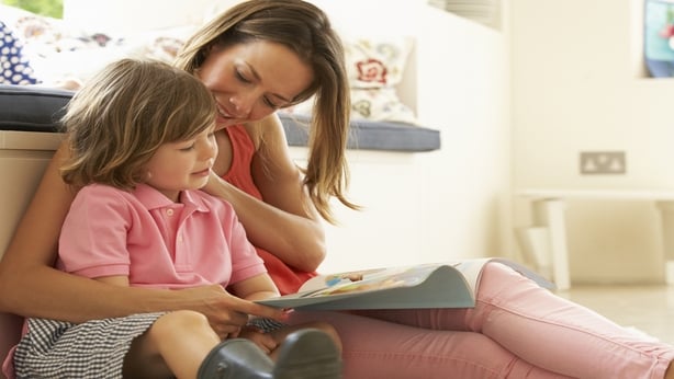 parent reading to child