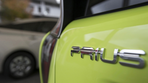 Toyota, which makes the Prius hybrid, said it now expects to sell 9.42 million cars this year