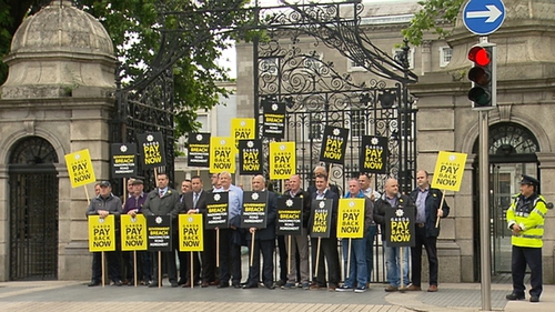 Members of the GRA protesting outside Leinster House