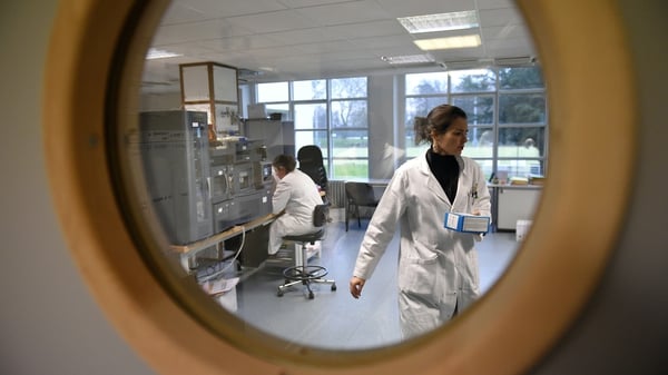 Workers inside an anti-doping lab