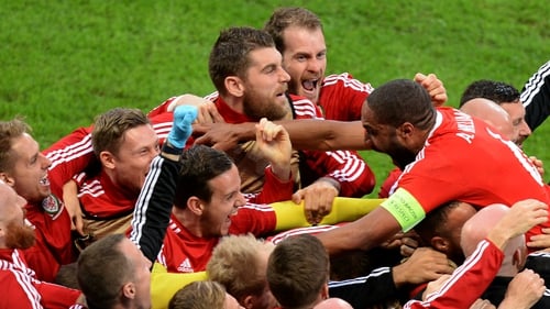 Wales celebrate Ashley Williams' (R) equaliser