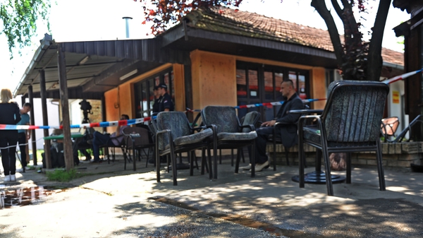 A man entered a cafe in northern Serbia and opened fire with an assault rifle