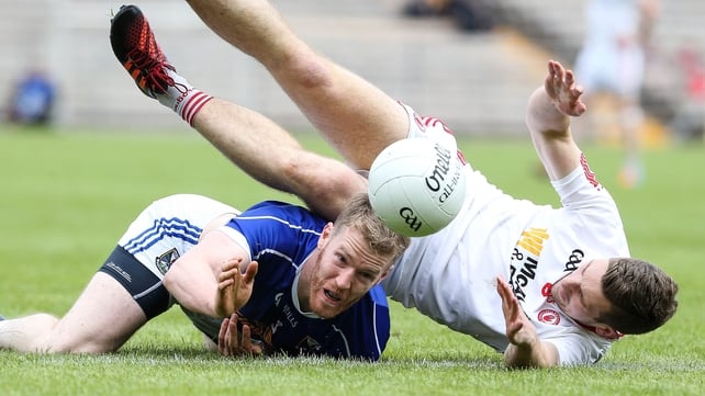 Niall Sludden and Rory Dunne get into a tangle