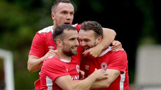 Christy Fagan celebrates his goal with Graham Kelly and Conan Byrne