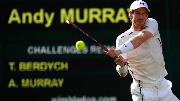 Andy Murray unleashes a crosscourt backhand winner in his victory over Tomas Berdych