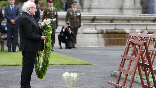 President Michael D Higgins lays a wreath at the Irish National War Memorial Gardens in Islandbridge, Dublin