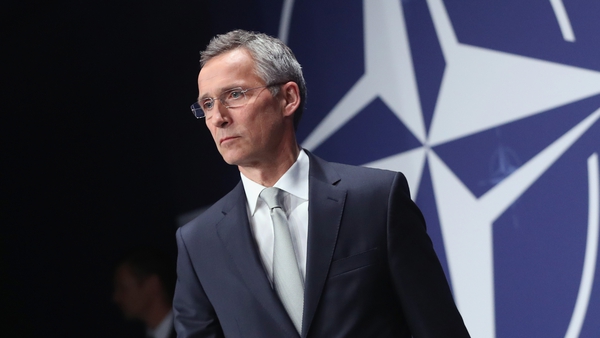 NATO Secretary General Jens Stoltenberg said the 28 NATO leaders had approved a plan for the alliance's planes to fly over international airspace and help the US-led coalition